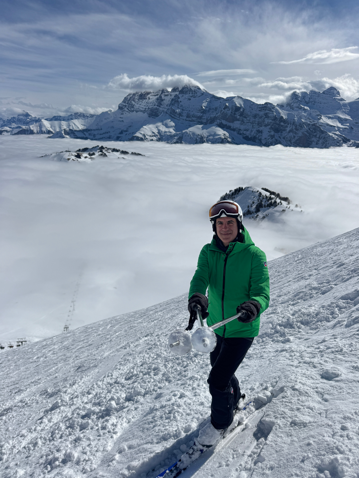 Cogo (Khosro Ronagh) skiing above the clouds — South America ski trip planner